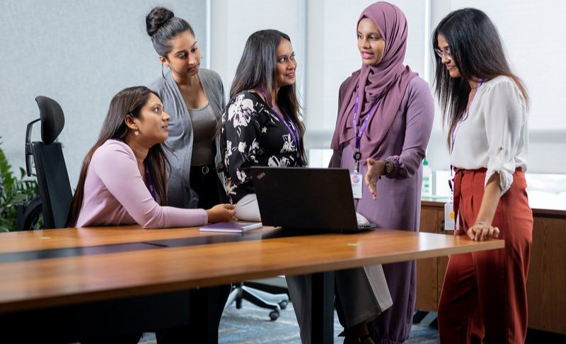 Group of women discussing diversity in the workplace